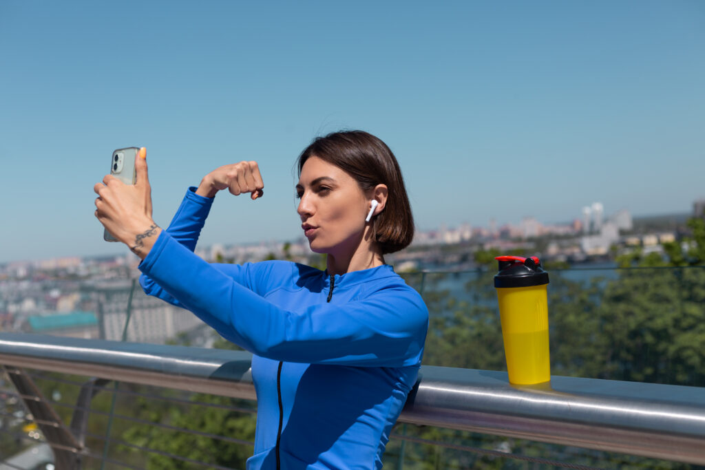 <a href="https://www.freepik.com/free-photo/young-woman-blue-sport-wear-bridge-hot-sunny-morning-with-wireless-headphones-mobile-phone-take-selfie-photo-video-socials-shows-her-muscles-biceps_14240307.htm#fromView=search&page=1&position=3&uuid=0b23cb86-dbfc-4d7c-8861-2035c31c0f1c">Image by kroshka__nastya on Freepik</a>