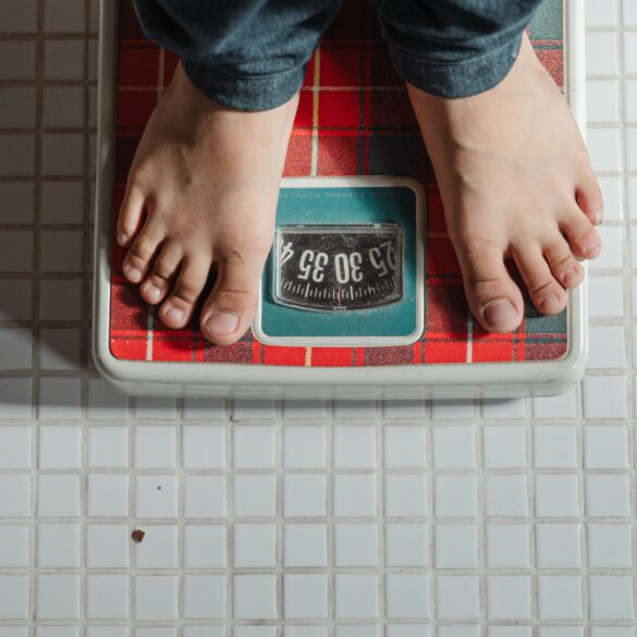 a man standing on a weighing scale