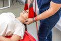 female-patient-hanging-suspensions-rehabilitation