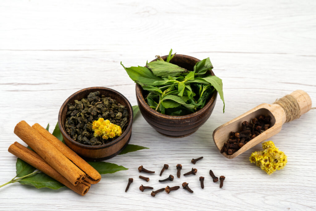 front view mint cinnamon with spices white ingredients plant color for Ayurvedic Detoxification