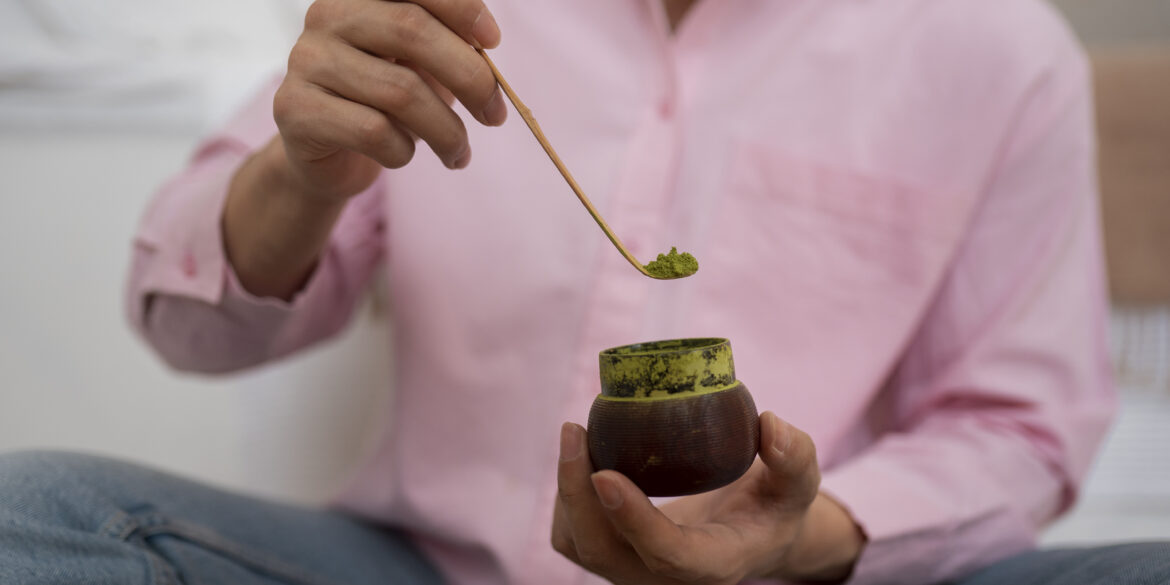 man preparing matcha tea