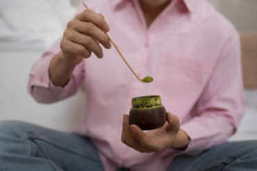 man preparing matcha tea