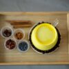 milk with turmeric and other ayurvedic herbs in a tray