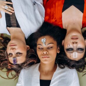 three women lying down
