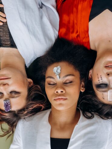 three women lying down