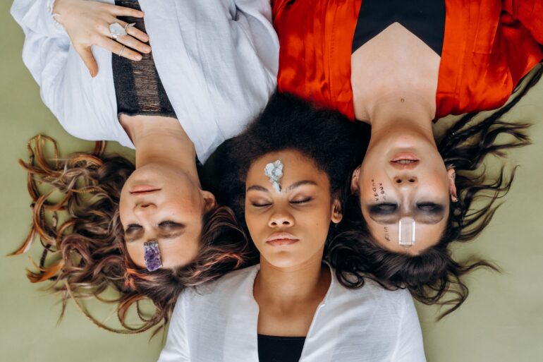three women lying down