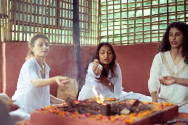 women performing some yoga rights