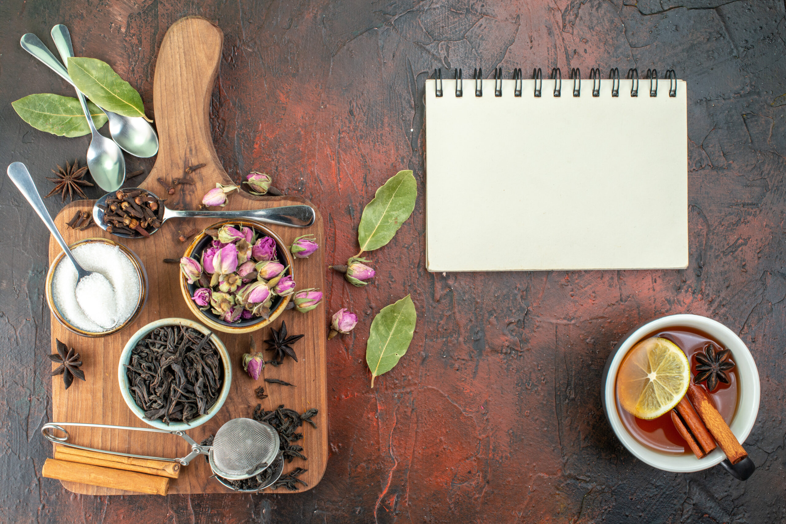 top view of cup tea with black tea dried flowers dark brown background tea fruit water color breakfast drink