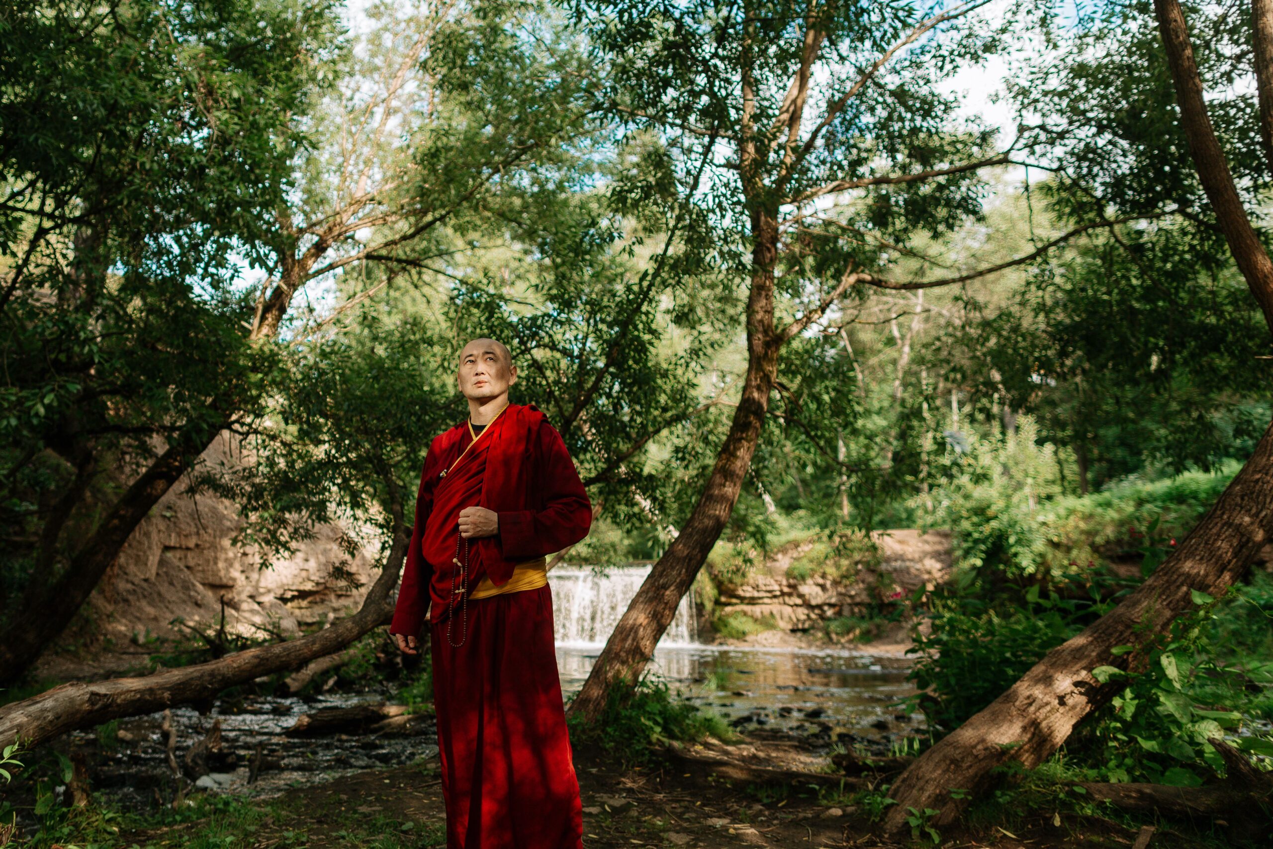 a monk standing in nature showcasing Forgotten Wisdom of Ayurveda