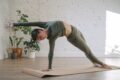 a woman doing a yoga pose