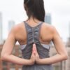 a woman doing a yoga pose