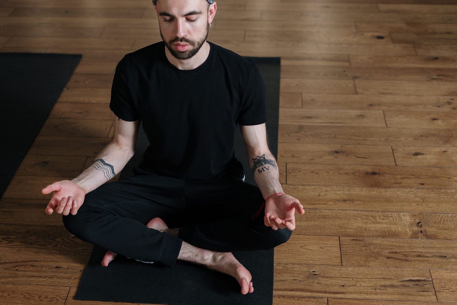 a man doing a yoga pose for The Inflammation Code