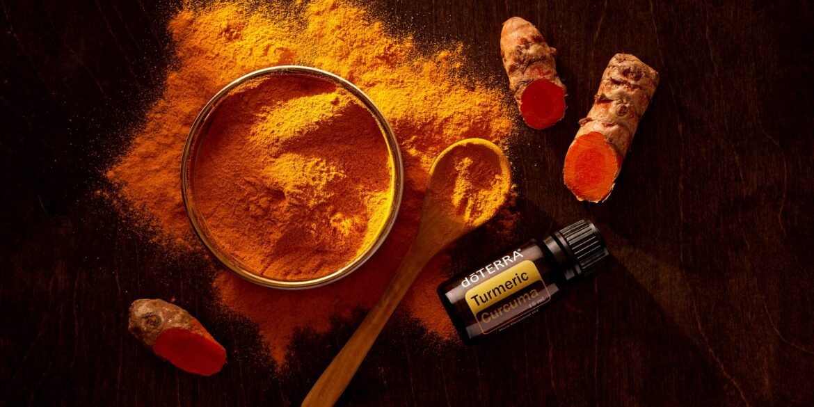 turmeric in a bowl, spoon and vials for Remedies for PCOS