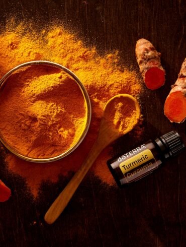 turmeric in a bowl, spoon and vials for Remedies for PCOS
