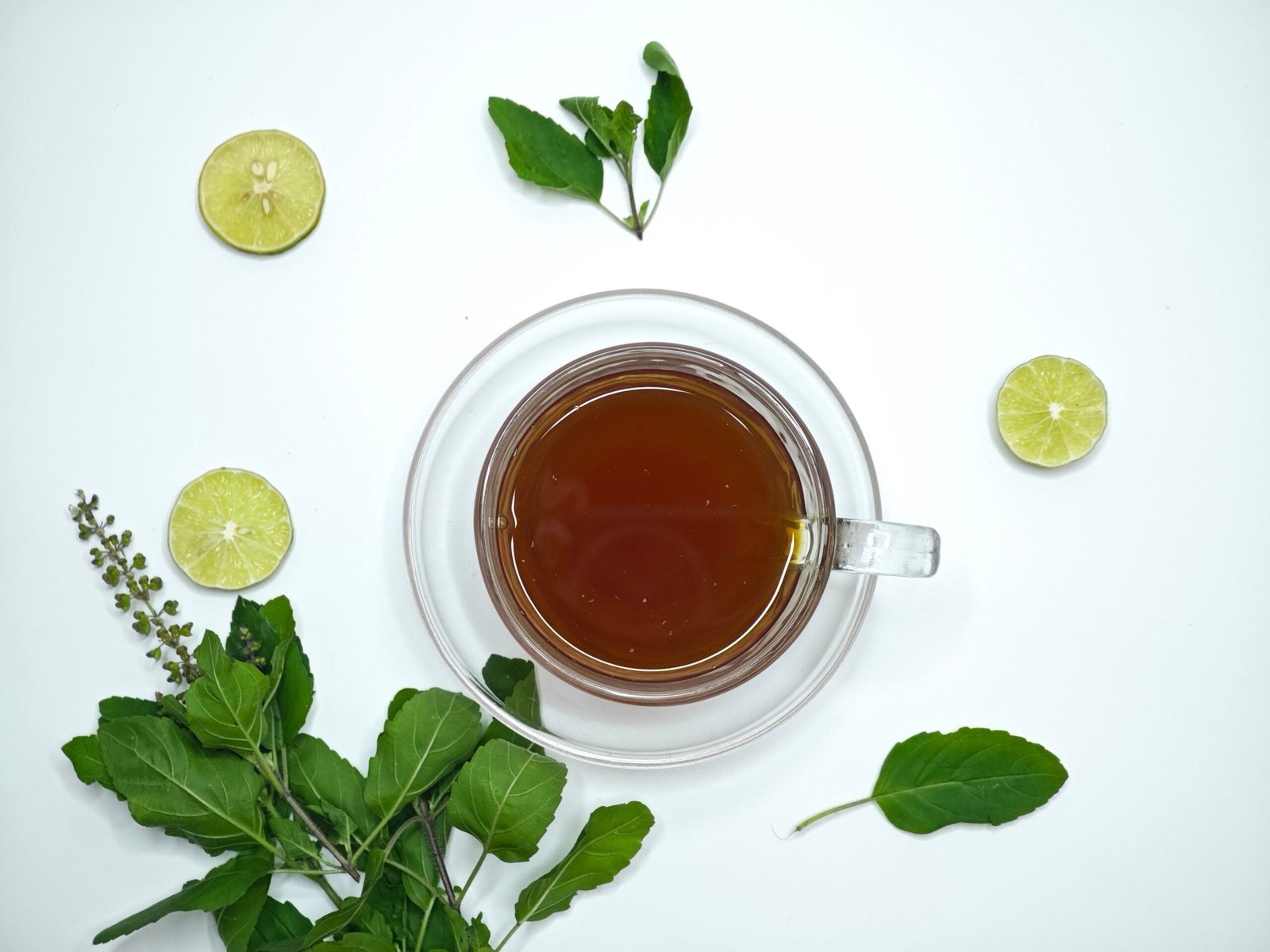 black tea in a cup with lemon for Remedies for PCOS