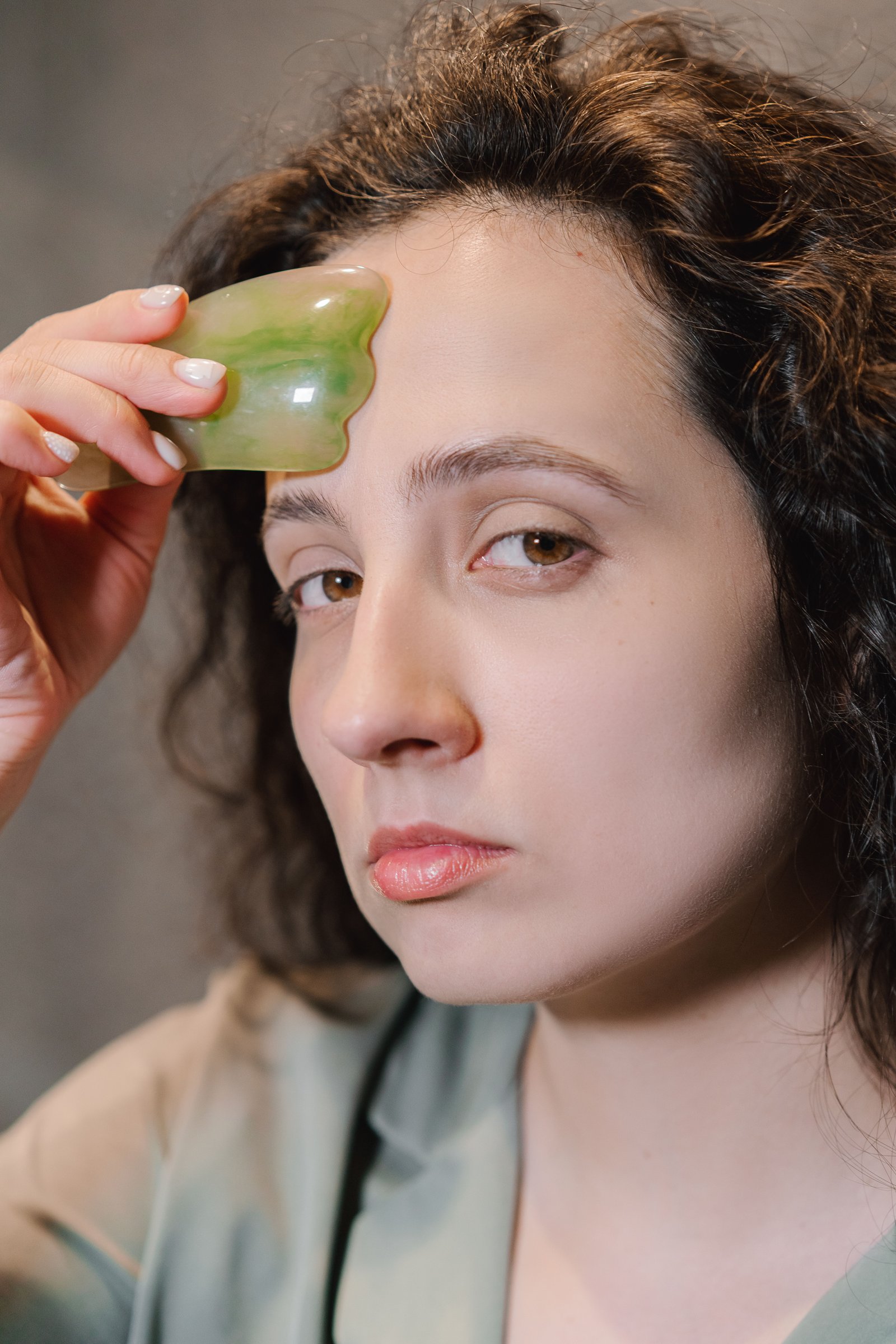 woman massaging face for Cellular Health Blueprint