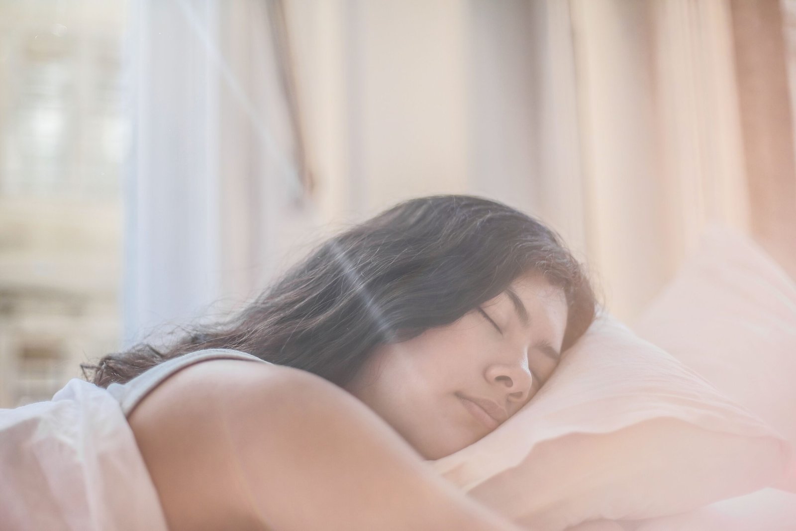 a woman sleeping symbolizing Ayurveda for Better Sleep and Brain Health