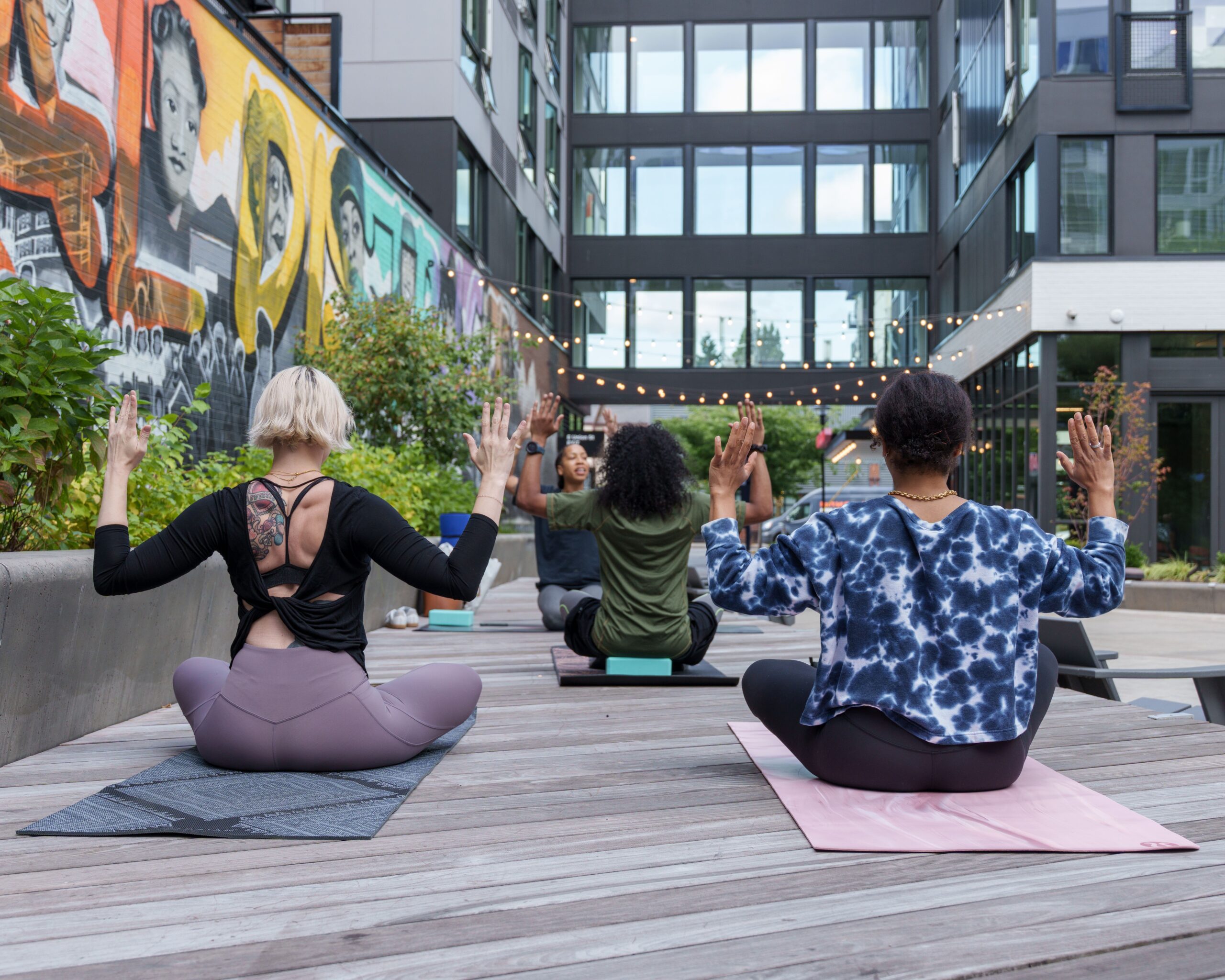 people doing yoga together