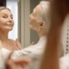 a woman helping another woman getting ready