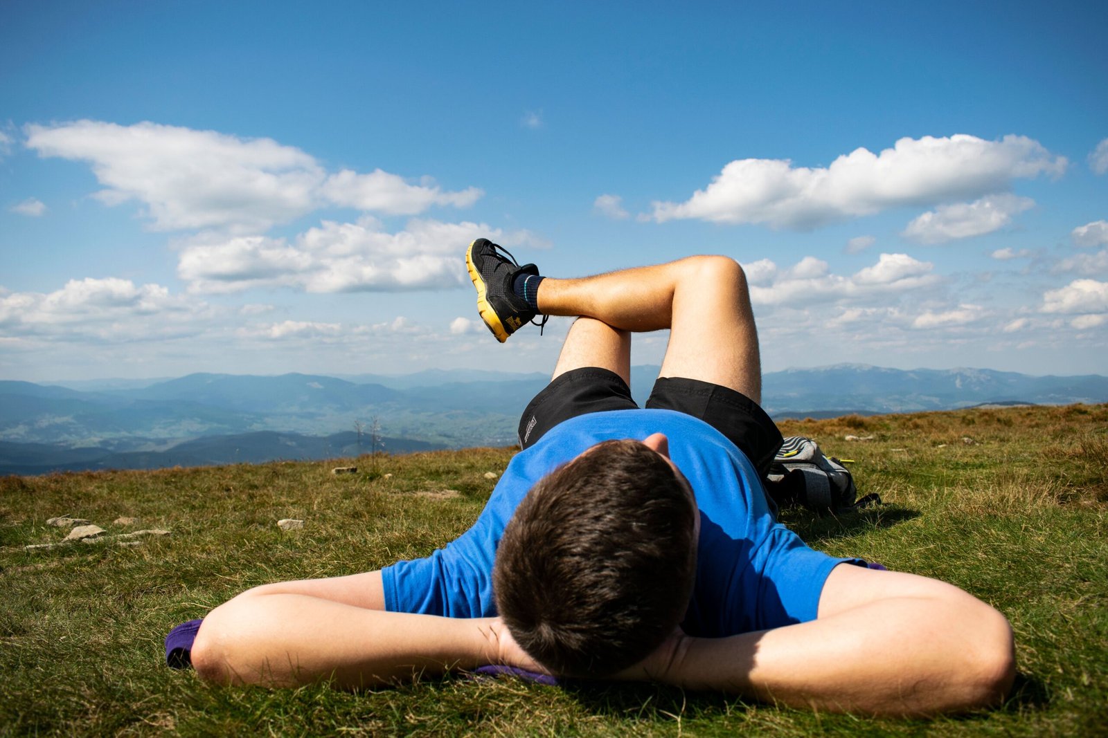 a guy relaxing in nature