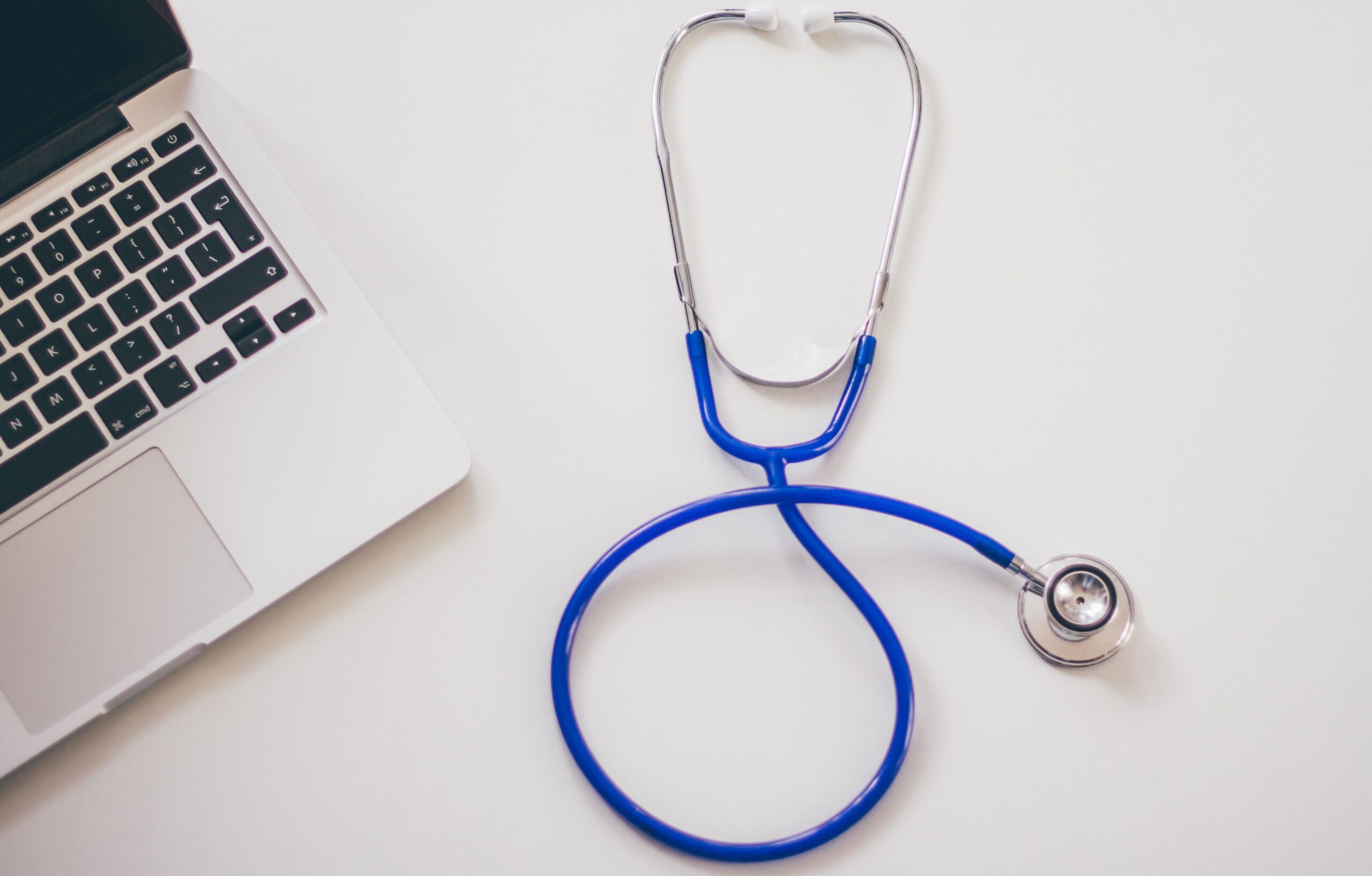 a laptop and stethoscope symbolizing Preventive Health