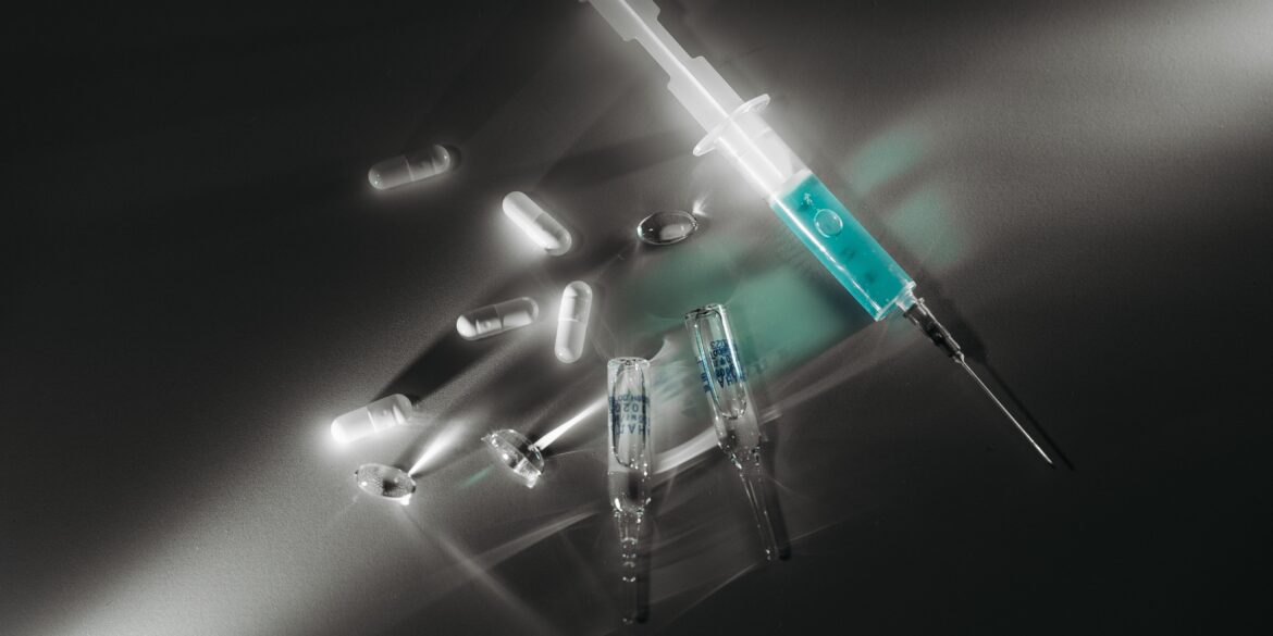 needles and injections lying on the floor for health breakthroughs