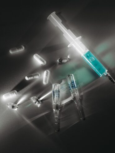 needles and injections lying on the floor for health breakthroughs