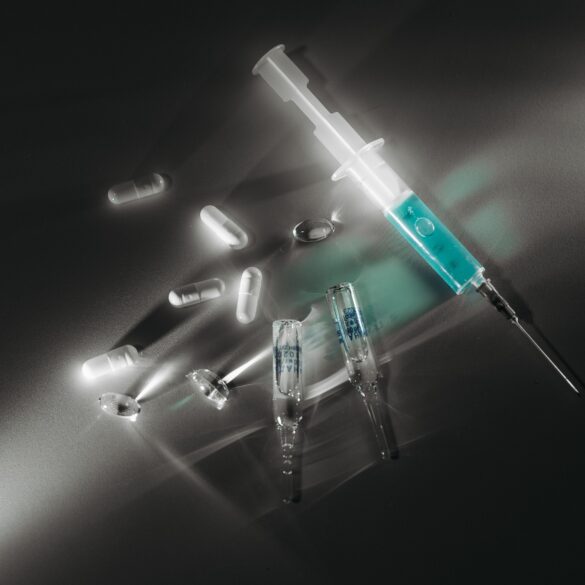 needles and injections lying on the floor for health breakthroughs