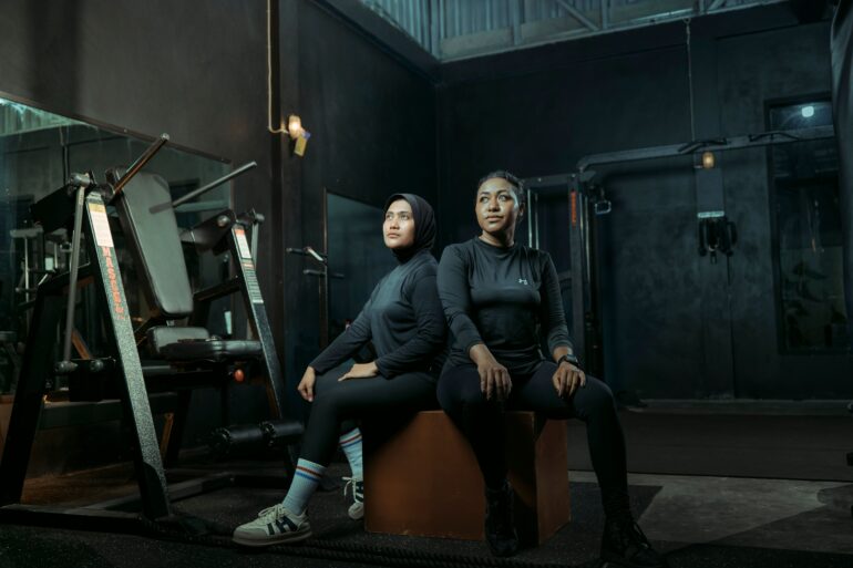 two well built women in the gym