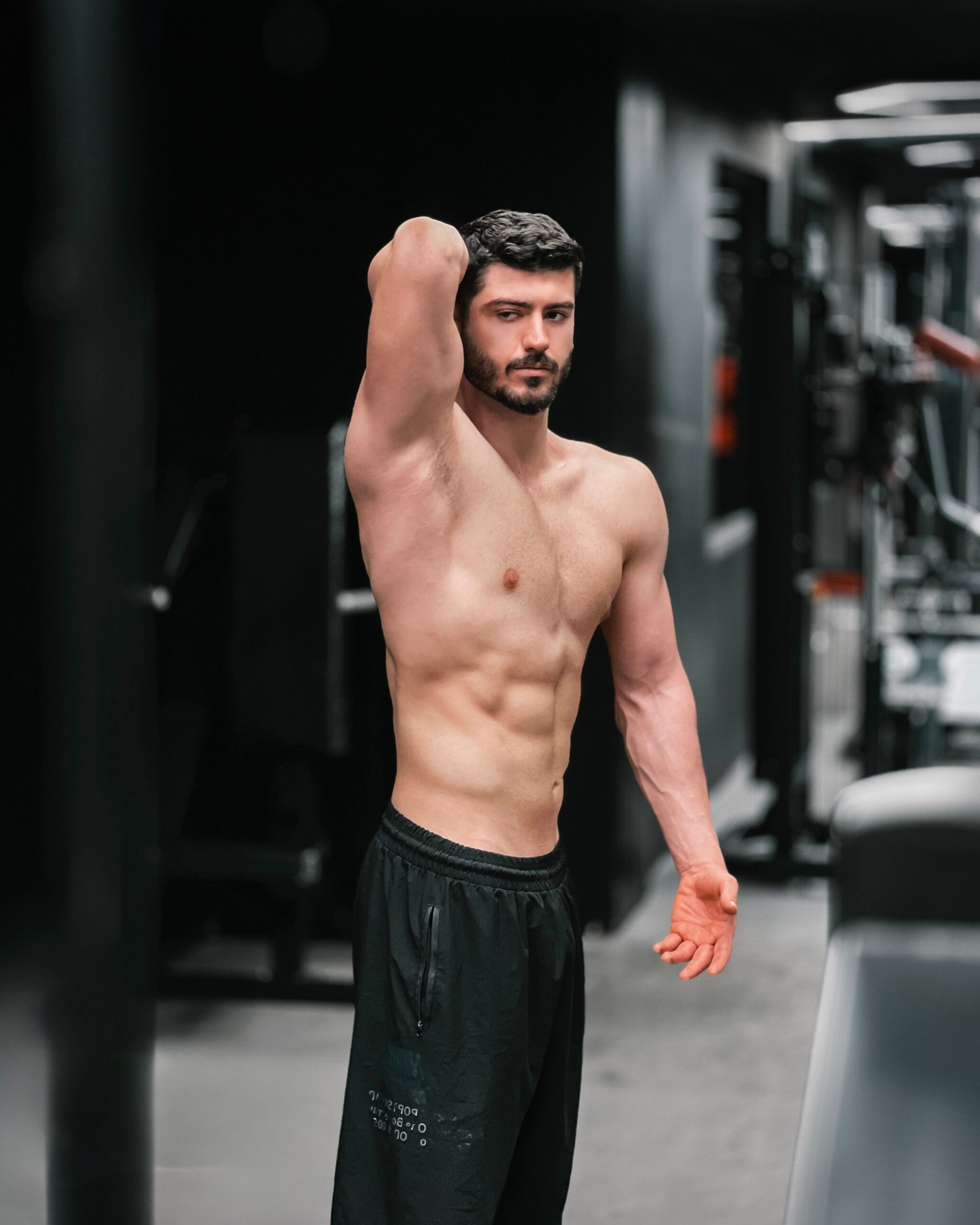 a man flexing his muscles