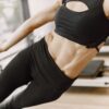 a woman doing a side plank for Stronger Core