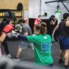 people in the gym boxing