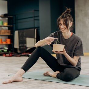 a woman eating a healthy diet after workout